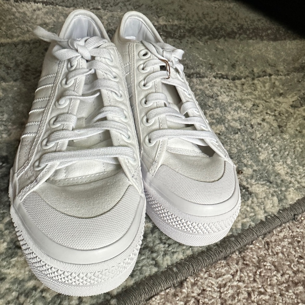 NWT white Adidas Nizza Platform Shoes with original box. Size 7.5 women’s